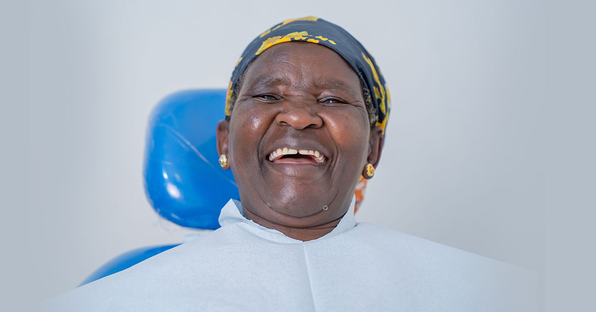 A smiling elderly Woman with a restored healthy smile